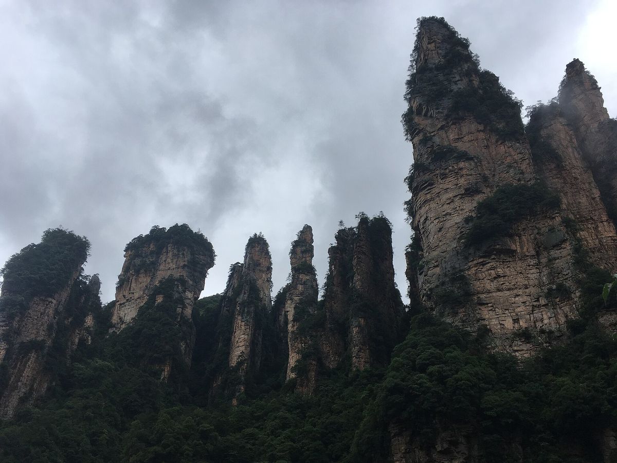 Quartz-sandstone pillars rising above the Yuanjiajie cliff railway